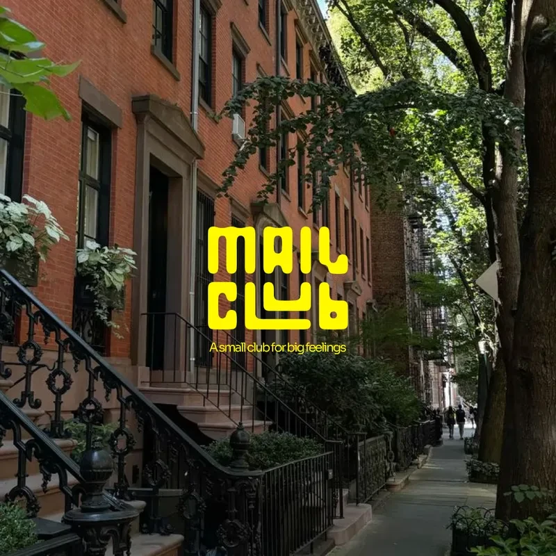 The Mail Club wordmark in yellow over a photograph of a brownstone street, with the line 'a small club for big feelings'.